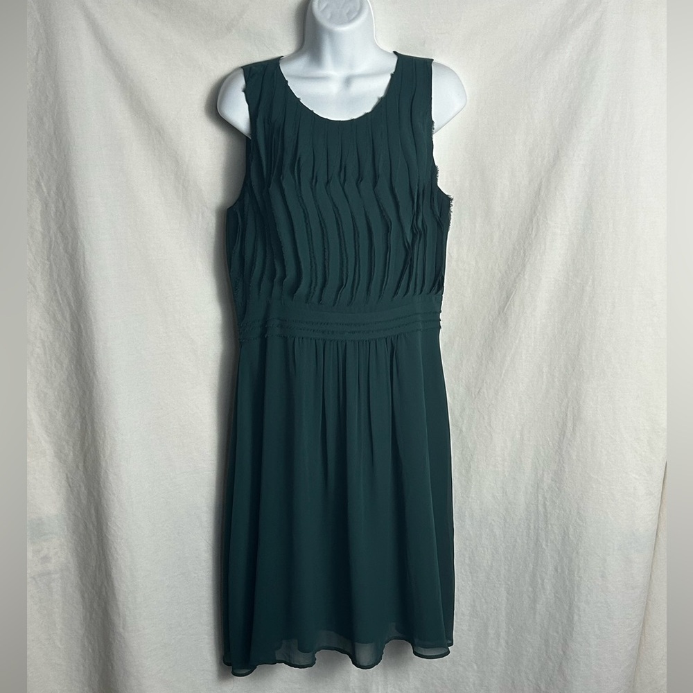 Dark hunter green sleeveless flowing pleated chiffon dress with a zipper back